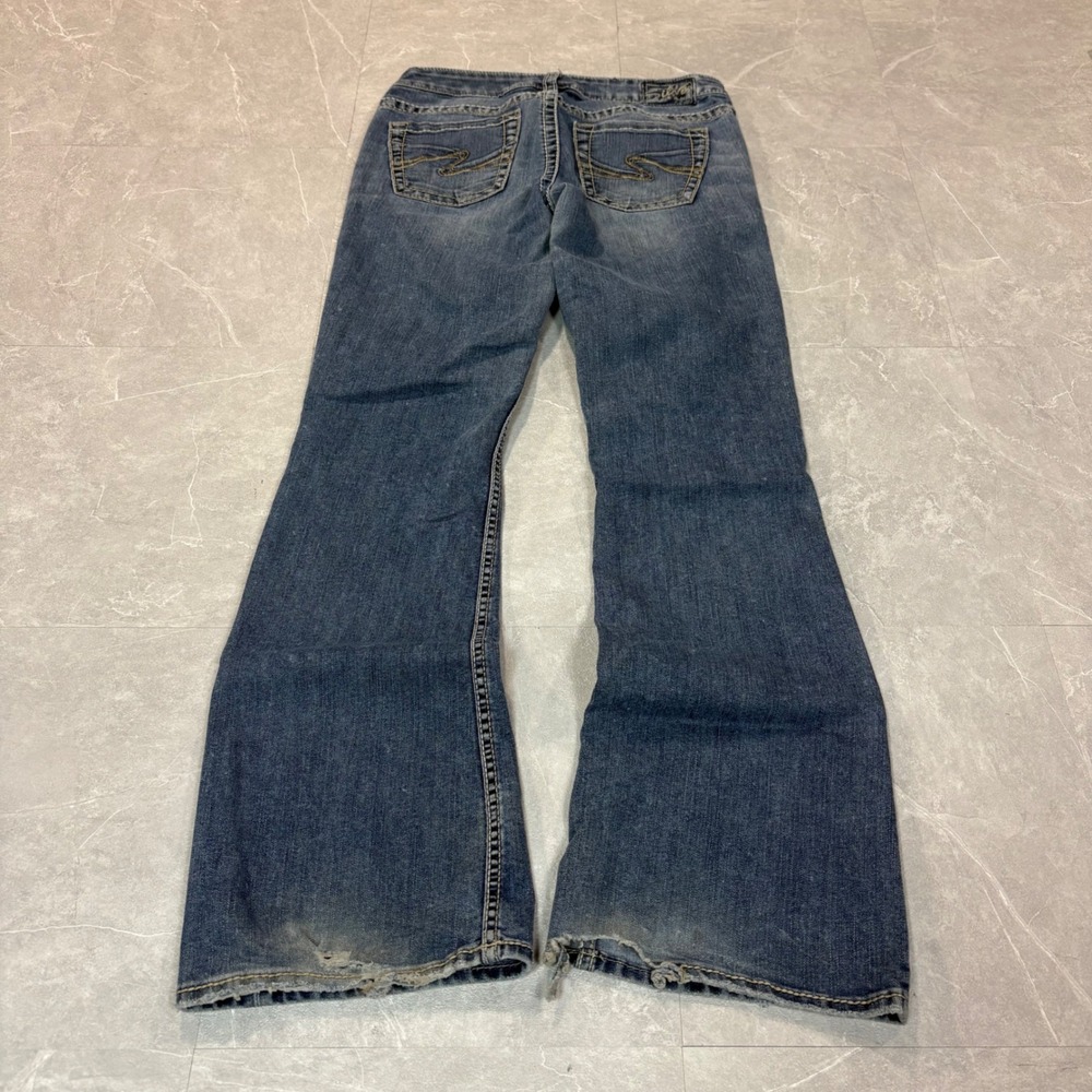 Silver Jeans Co Aiko Flare Leg Denim Jeans Mid Wash Blue Distressed Hem 29x32
